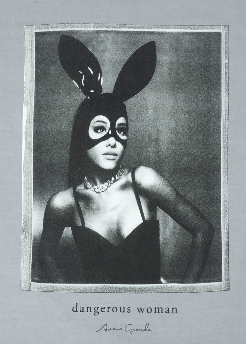 Close-up of Ariana Grande Dangerous Woman graphic print with signature bunny mask portrait on gray cotton T-shirt