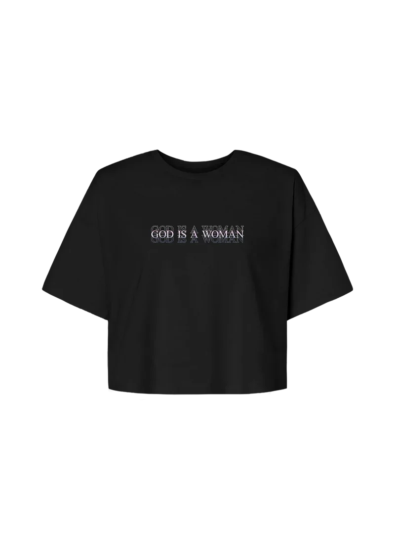 Black Ariana Grande God Is A Woman cropped T-shirt with minimalist layered text graphic and relaxed modern fit