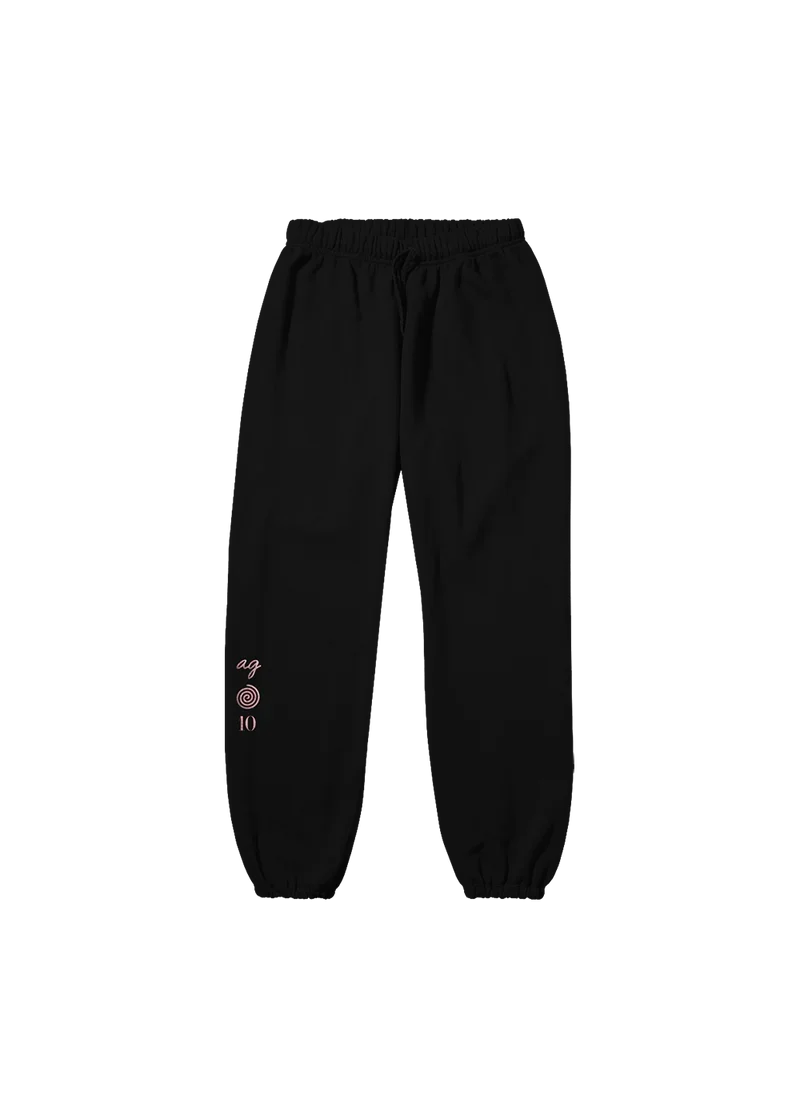 Black Ariana Grande My Everything 10th anniversary puff print sweatpants with pink ag spiral logo graphic on leg