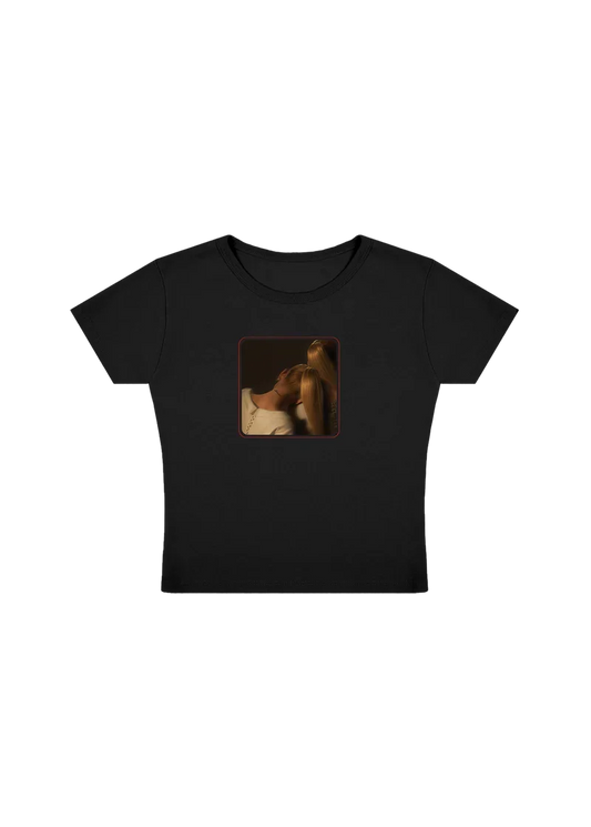 Black ag7 cropped t-shirt with warm-toned Ariana Grande photo graphic front view