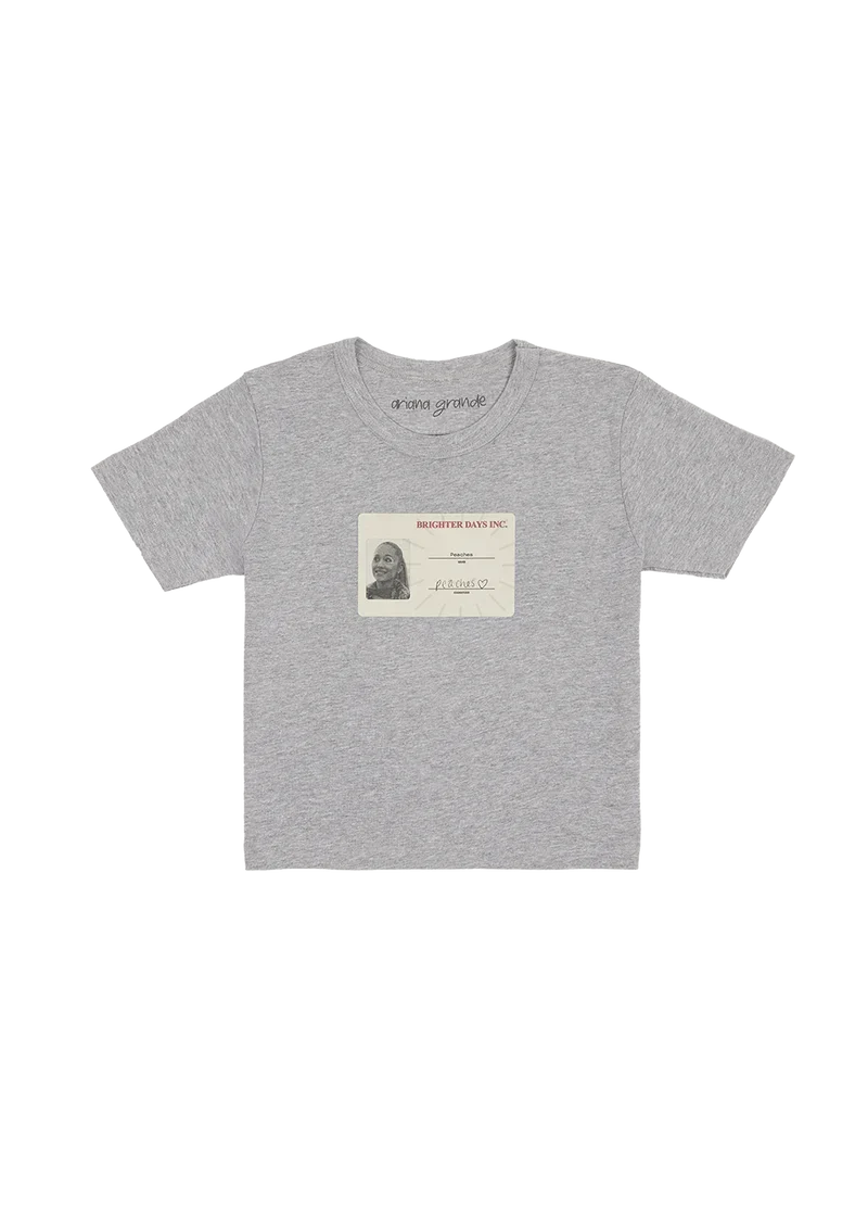 Ariana Grande Brighter Days cropped grey t-shirt featuring vintage ID badge graphic and baby tee silhouette front view
