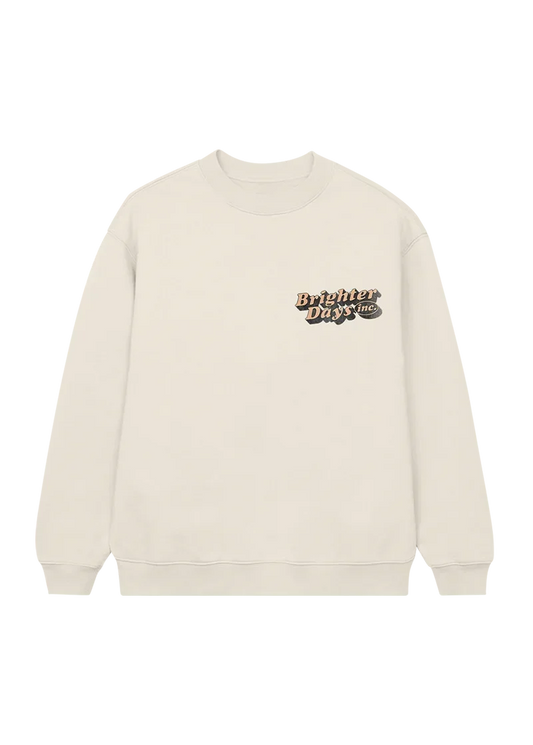 Ariana Grande Brighter Days Memories cream crewneck sweatshirt with minimalist chest logo graphic front view