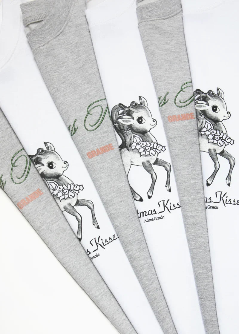 Ariana Grande Christmas Kisses holiday crewneck and matching reindeer apparel collection lifestyle display