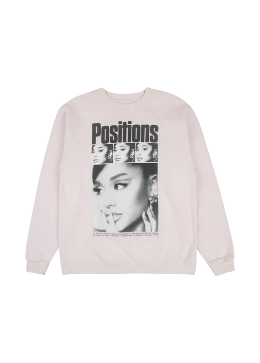 Light pink Ariana Grande Positions crewneck front view with retro collage portrait graphic and album tracklist
