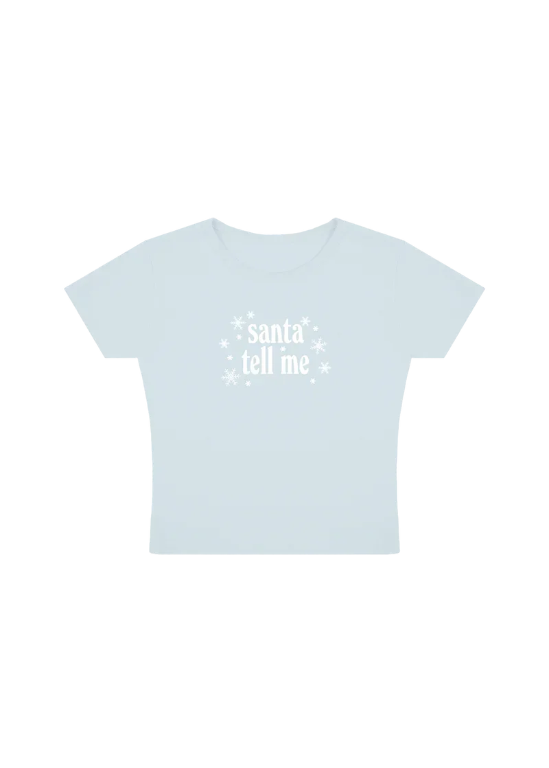 Ariana Grande Santa Tell Me light blue baby t-shirt with white snowflake holiday graphic front view