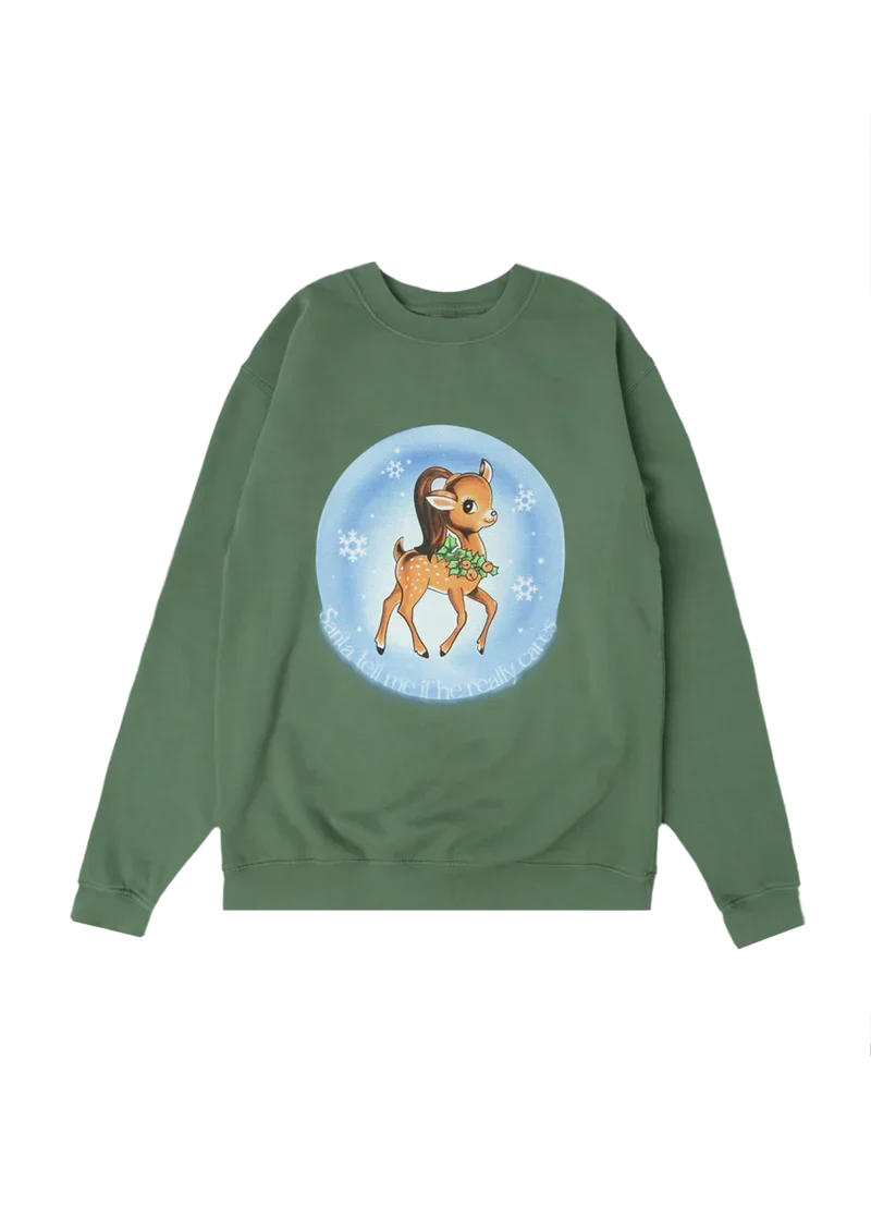 Green Ariana Grande Santa Tell Me crewneck with vintage deer holiday graphic and dreamy winter aesthetic