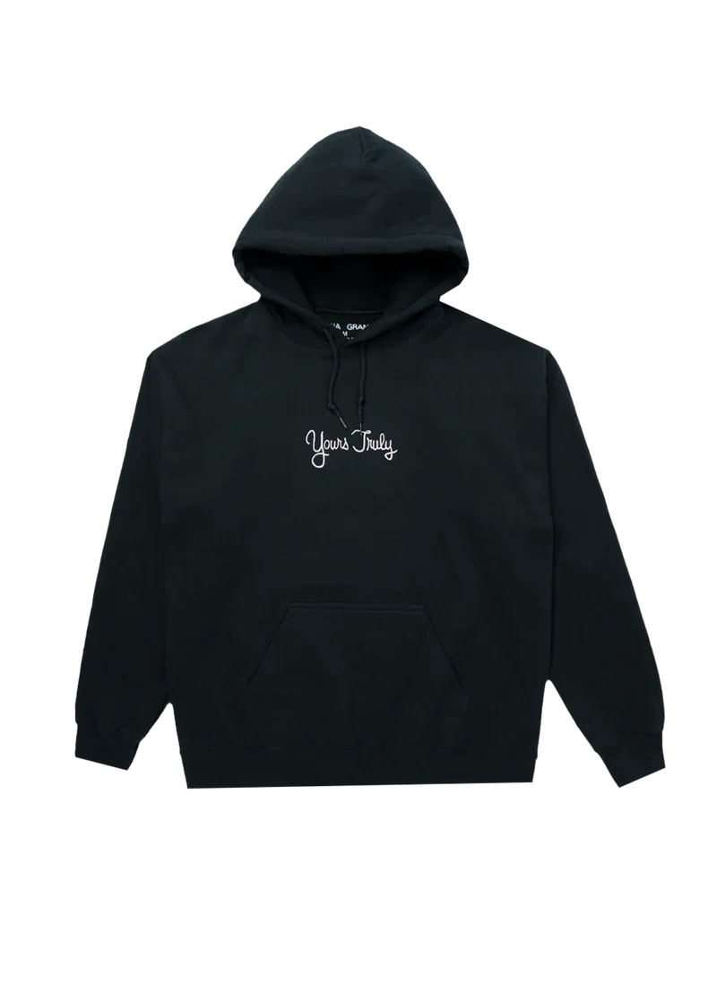 Black Ariana Grande Yours Truly hoodie front view with minimalist embroidered logo and relaxed fit