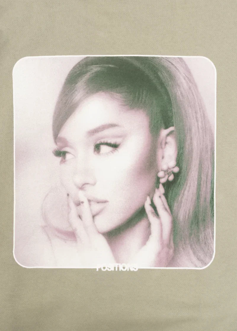 Beige Positions hoodie with soft pink Ariana Grande inverted cover portrait graphic detail